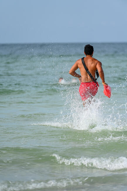 Rescue Coordination: Moving Beach Lifeguards Under Emergency Services