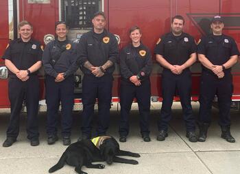 “The first time we took Demeter to the firehouse after we completed our training with Circle Tail, everyone was really excited to meet him—and vice versa,” handler Erica Marion says. 