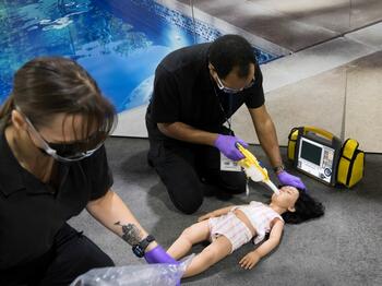 Agency ride-alongs, interactive  simulations, a bustling exhibit hall, and scientific poster presentations were just some of the highlights during the event. 